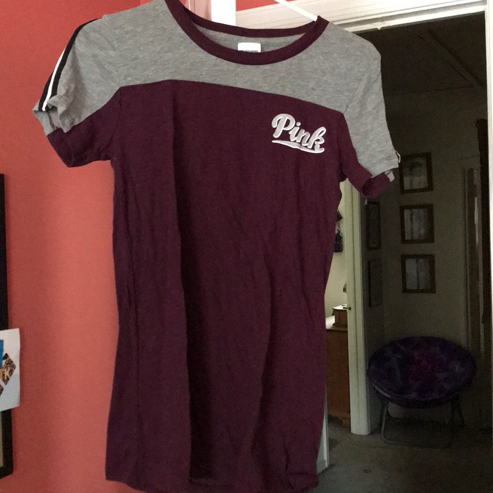 Purple and gray t-shirt.